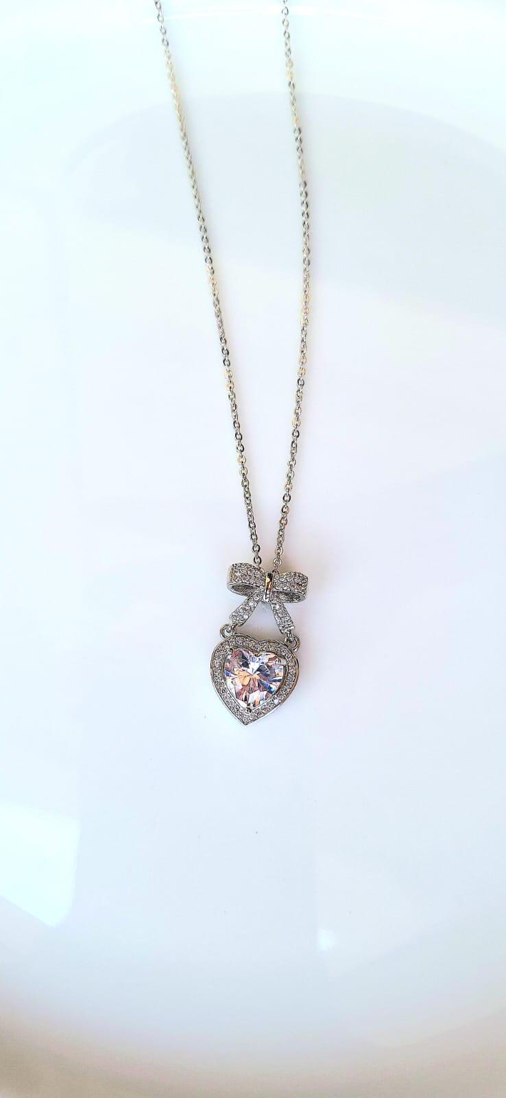 STAINLESS STEEL BOW HEART PENDANT