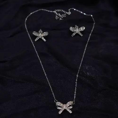 STAINLESS STEEL RIBBON BOW PENDANT SET