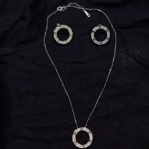 STAINLESS STEEL SILVER CARTIER COLLIER SET